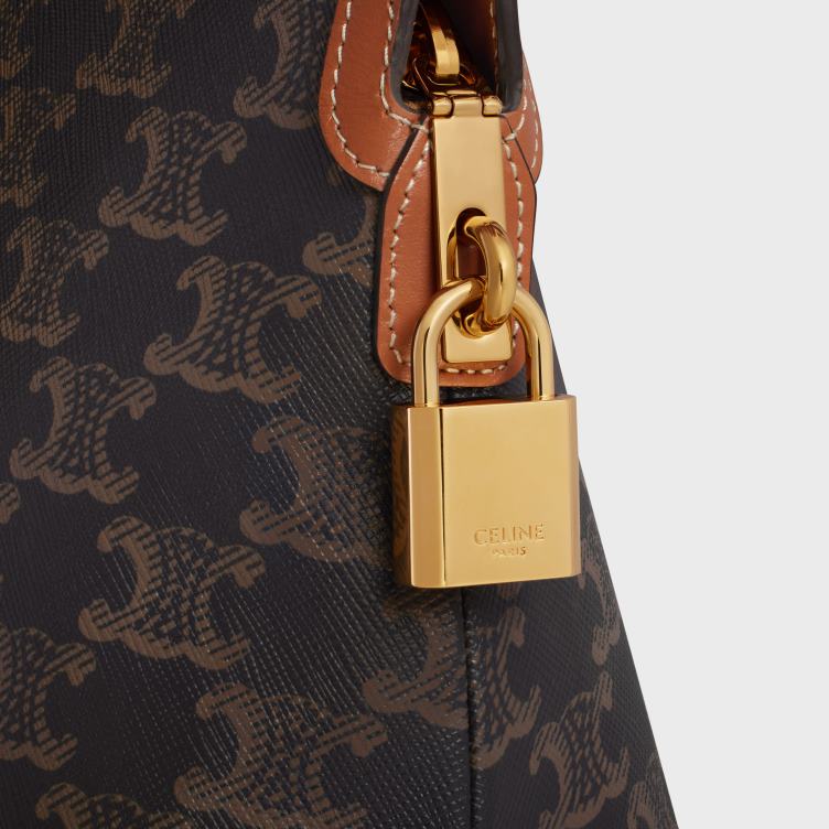 CELINE bruinen toilettasje van triomphe-canvas en kalfsleer 4TLH81487