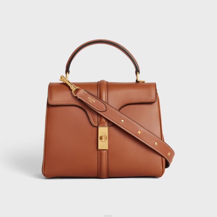 CELINE bruinen lange riem van glad kalfsleer met triomphe-noppen met gouden afwerking 4TLH8521