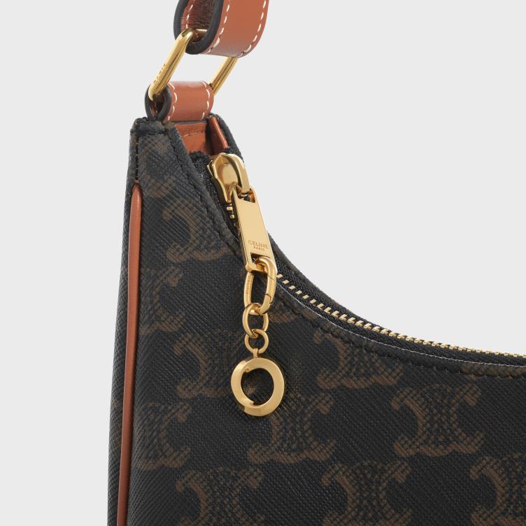 CELINE goud o charme in messing 4TLH8539