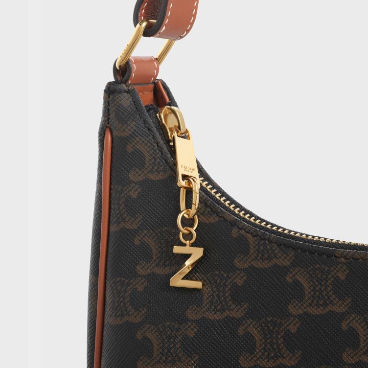 CELINE goud z-charme in messing 4TLH8546